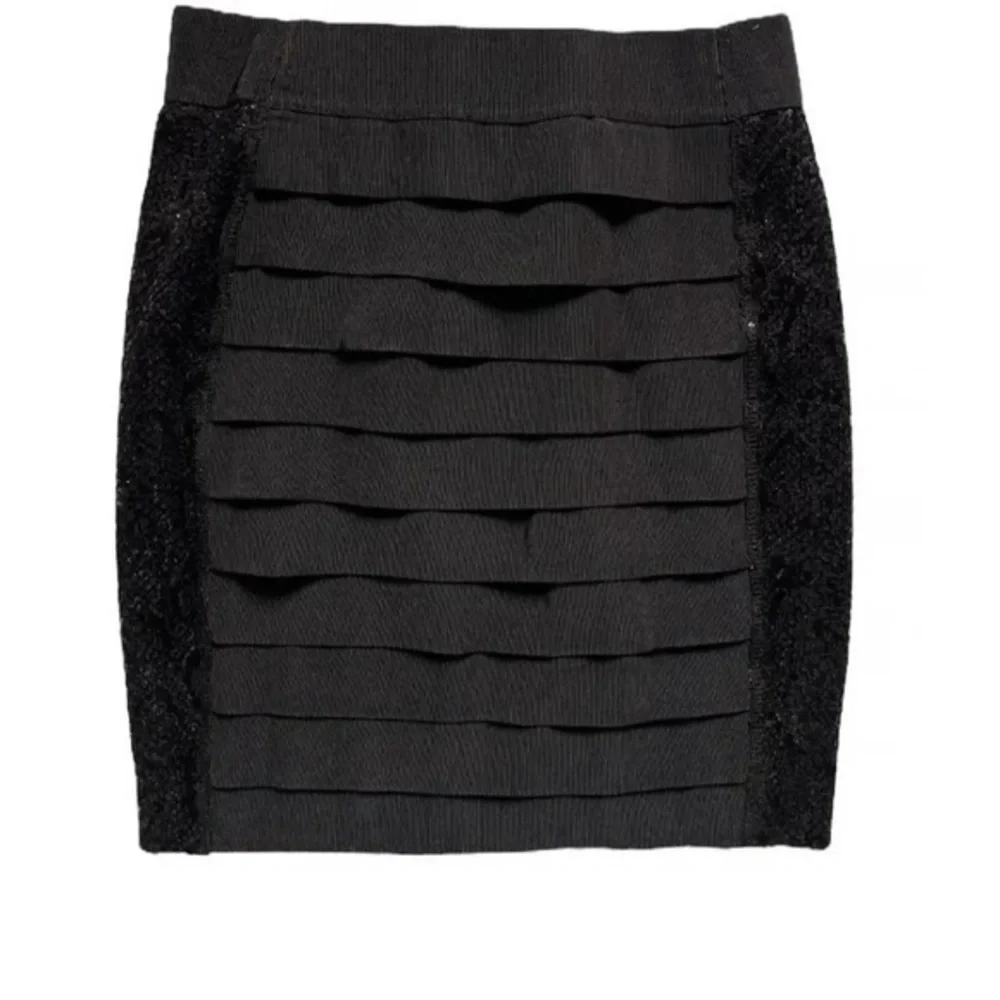 Tory Burch black mini bandage skirt with glitter side panels Size M